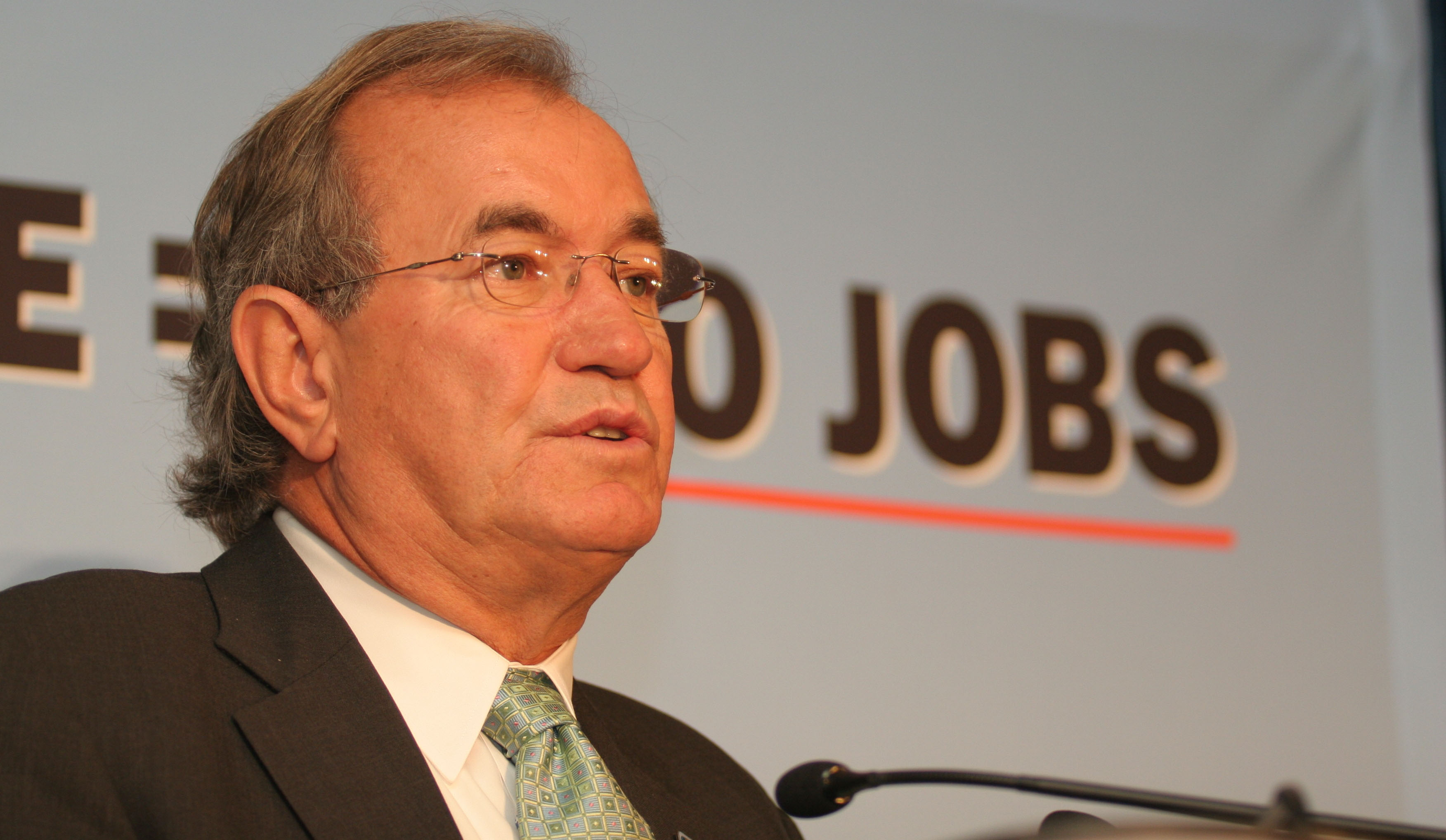 Buzz Hargrove at a microphone